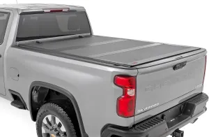 Rough Country Hard Tri-Fold Truck Bed Tonneau Cover for Chevy Silverado & GMC Sierra 2500HD/3500HD (2020-2025) - Aluminum Flip-Up Folding Bed Cover, Fits 6'9 Bed