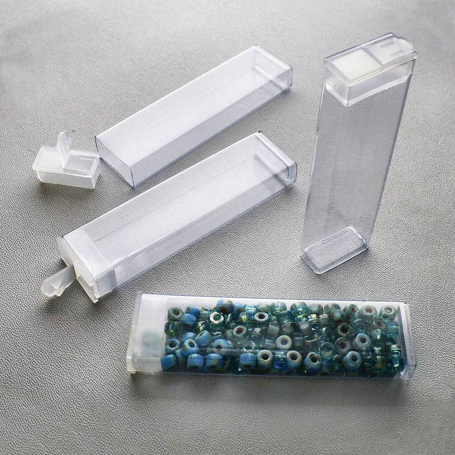 The Beadsmith Clear Plastic Boxes - Rectangle with a Flip Top Cap - 7/16” x 1” x 3-1/4” - Use for Beads, Bath Salts, Wedding & Party Favors, Home or Office Storage - Bag of 100